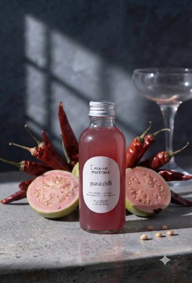 Guava Chilli Mocktail Mixer bottle with pink guava and dried red chillies
