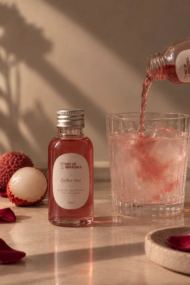 Lychee Rose mixer being poured over ice